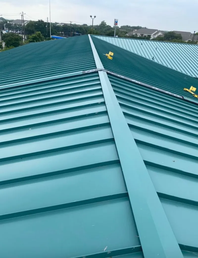 Green commercial metal roof ridge and valley for Metal Roof Repair in Fairfax Station